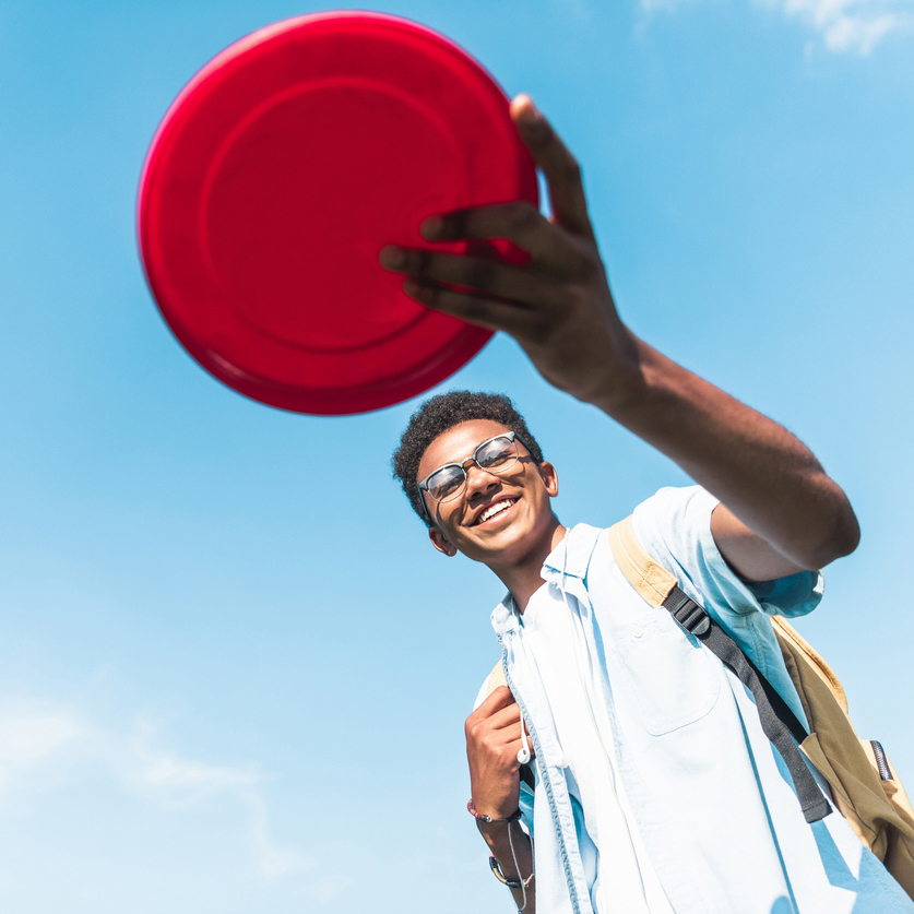 person with frisbee