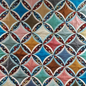Quilt with colorful diamonds