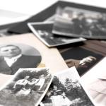 Old photographs scattered on the floor
