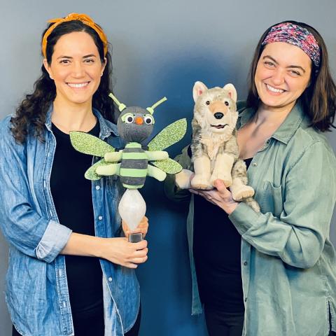 Two members of Firefly Family Theater holding puppets