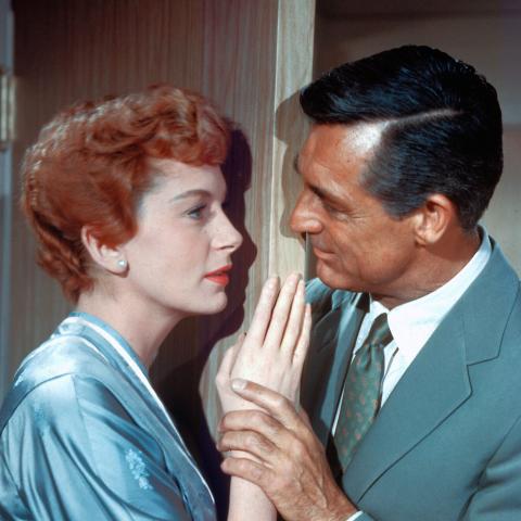 actors Cary Grant and Deborah Kerr looking at each other