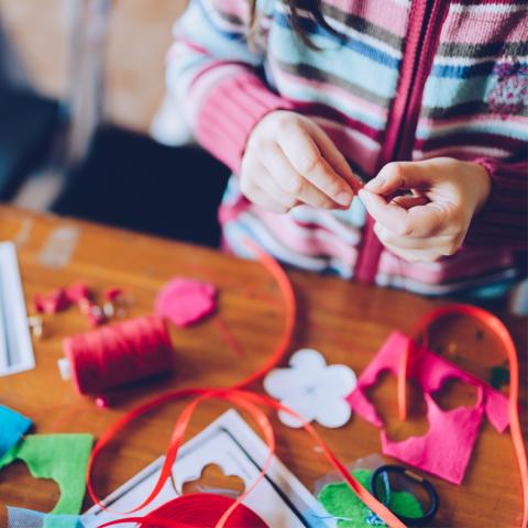 Child using craft materials