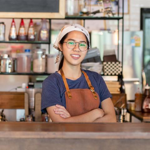 Teen worker at a cafe