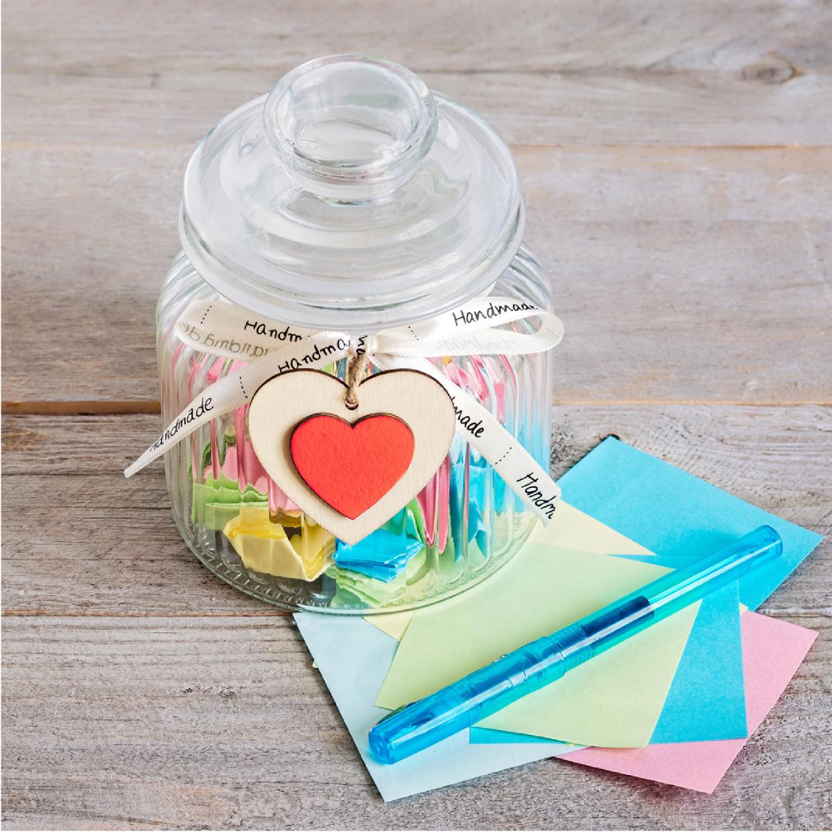 A jar filled with colorful notes