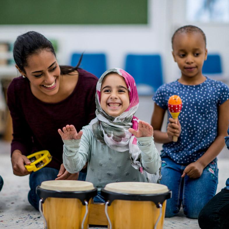 Child playing drum