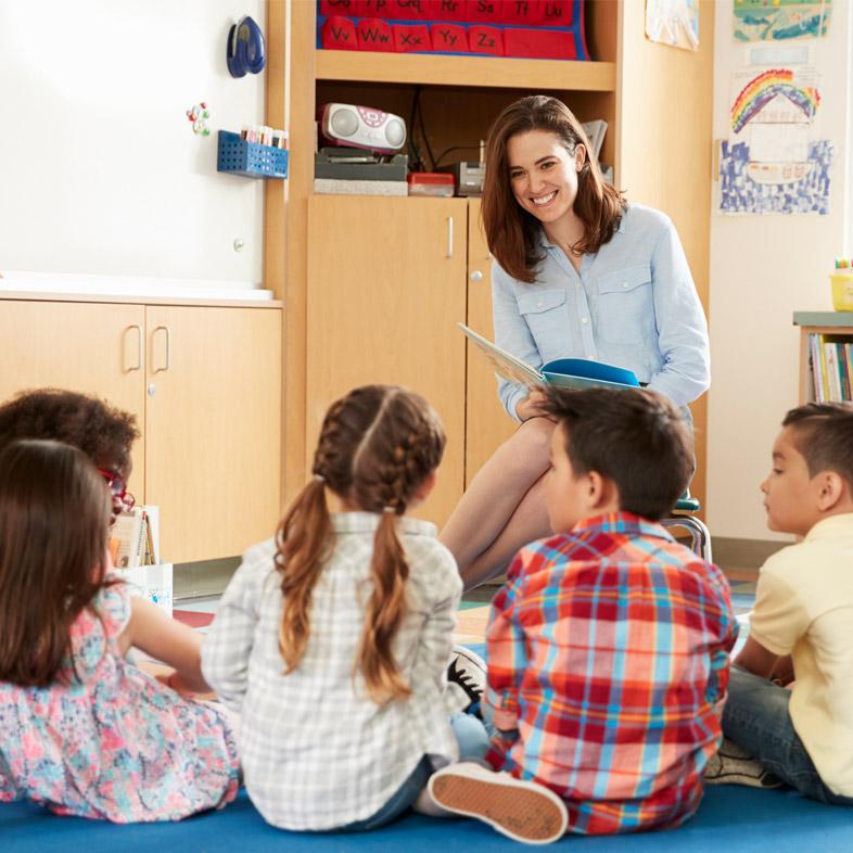 Teacher reading story to class