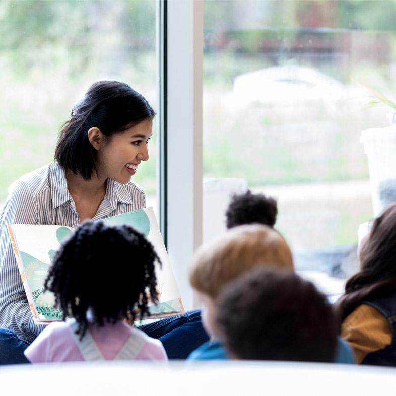 Teacher reading story aloud