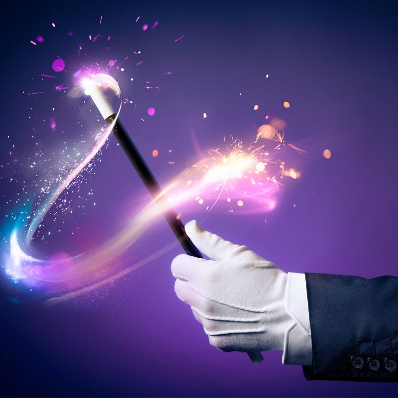 Magician holding wand 